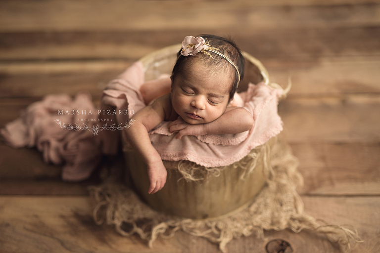 newborn photo in basket