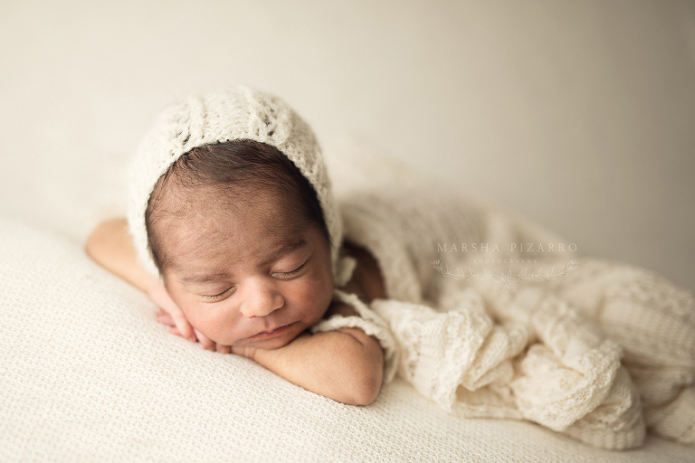 ecru newborn photo with blanket