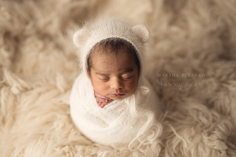 newborn with little bear ears