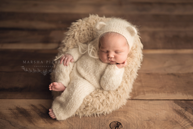 little baby bear on beanbag
