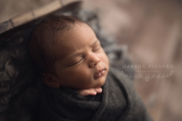 sleeping Calgary newborn boy