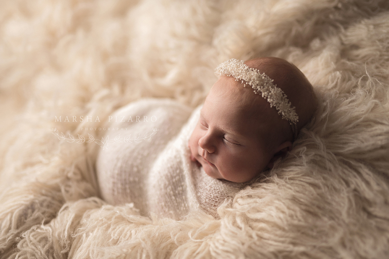 White background at wrap used during studio newborn session