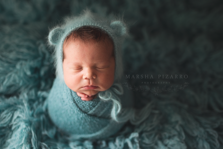 swaddled newborn photo 