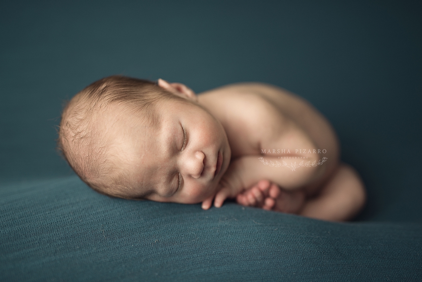 How to Pose a Baby From One of Dallas' Best Newborn Photographers